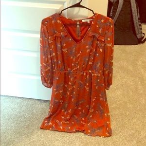 Flowy, chiffon dress in rust color w/floral print!